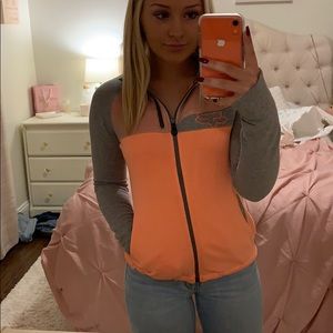 Bright peachy orange FOX riders jacket